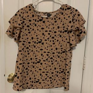 Woman’s ruffle sleeve blouse